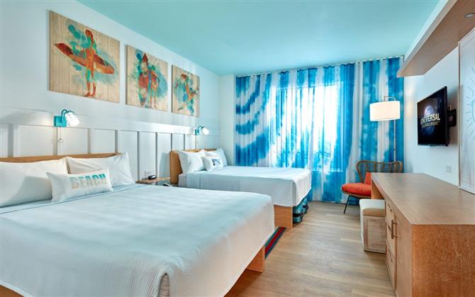 Surfside Inn and Suites do Endless Summer carrega surfe e praia como temas na decoração e design