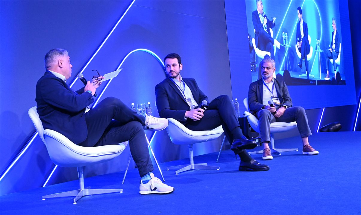 Roberto Junior (Enel), Ralph Weigand (Uber) e Augusto Bezerra (Localiza) em debate realizado durante o Download 2024 