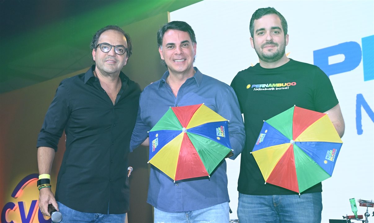 Fabio Godinho e Emerson Belan, da CVC Corp, com Eduardo Loyo, da Empetur