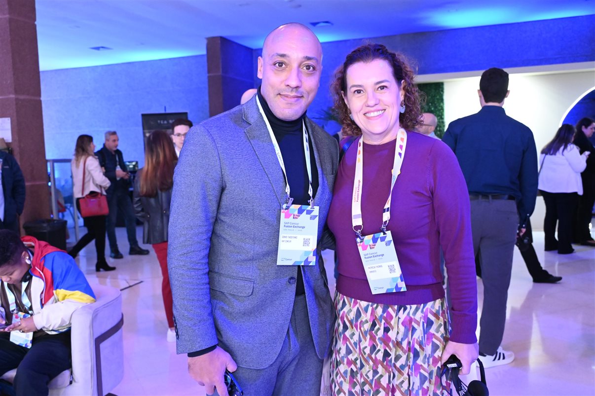 Denis Tassitano, da SAP Concur, e Patricia Thomas, da Omnibees