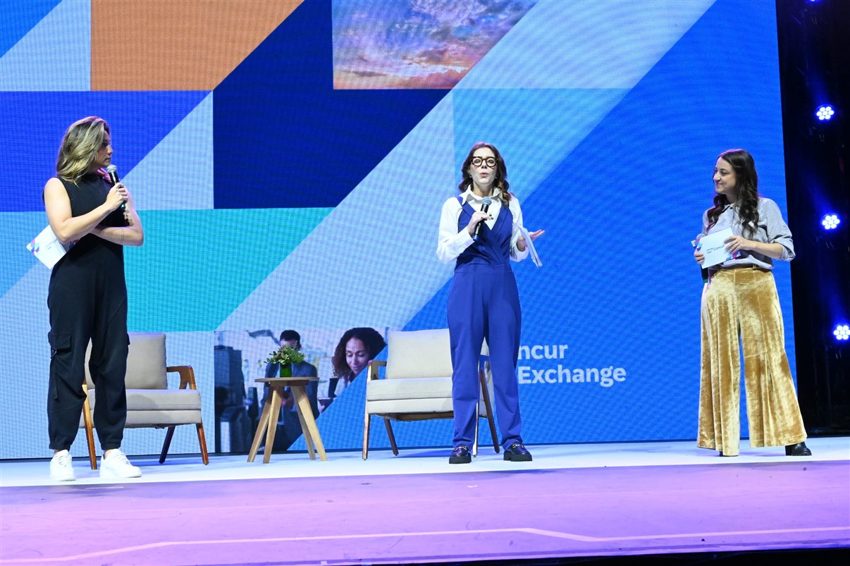 Denis Tassitano, da SAP Concur, e Patricia Thomas, da Omnibees