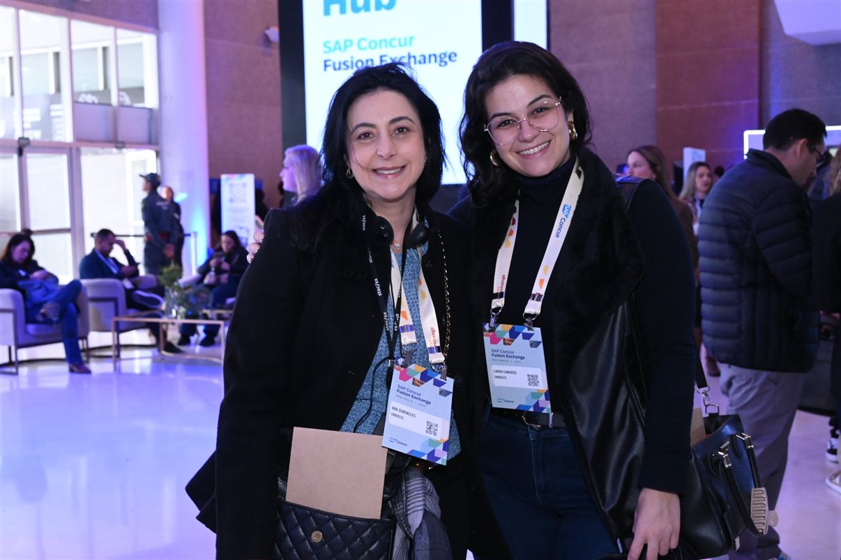 Denis Tassitano, da SAP Concur, e Patricia Thomas, da Omnibees