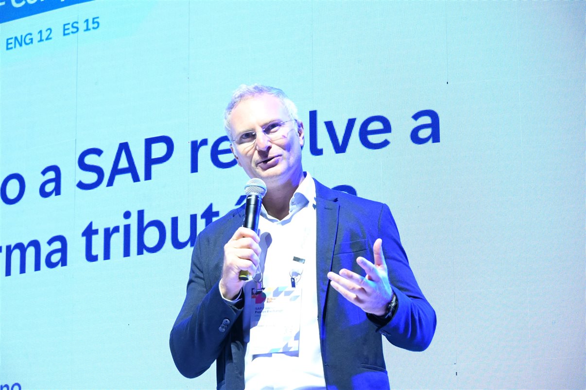 Denis Tassitano, da SAP Concur, e Patricia Thomas, da Omnibees