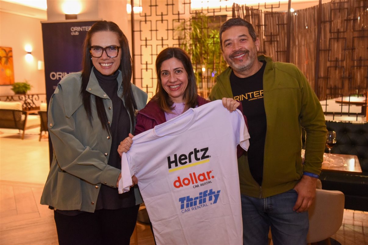 Lia Hirakawa Cruz, do Visit Miami, ao lado de Jorge Souza, da Orinter