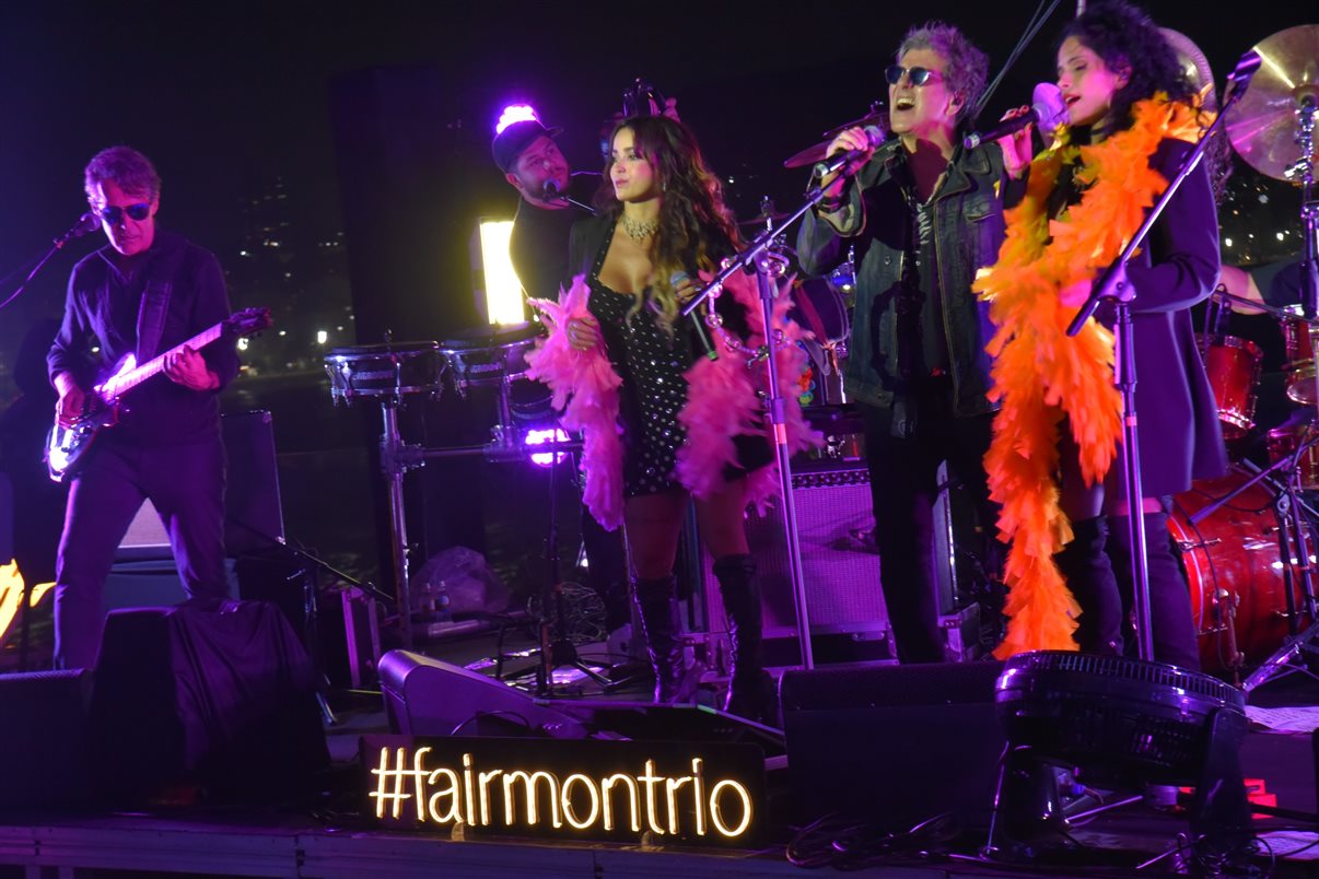 Netto Moreira, do Fairmont, entre Luiz Strauss e Tereza Romeiro, da Promotional Travel