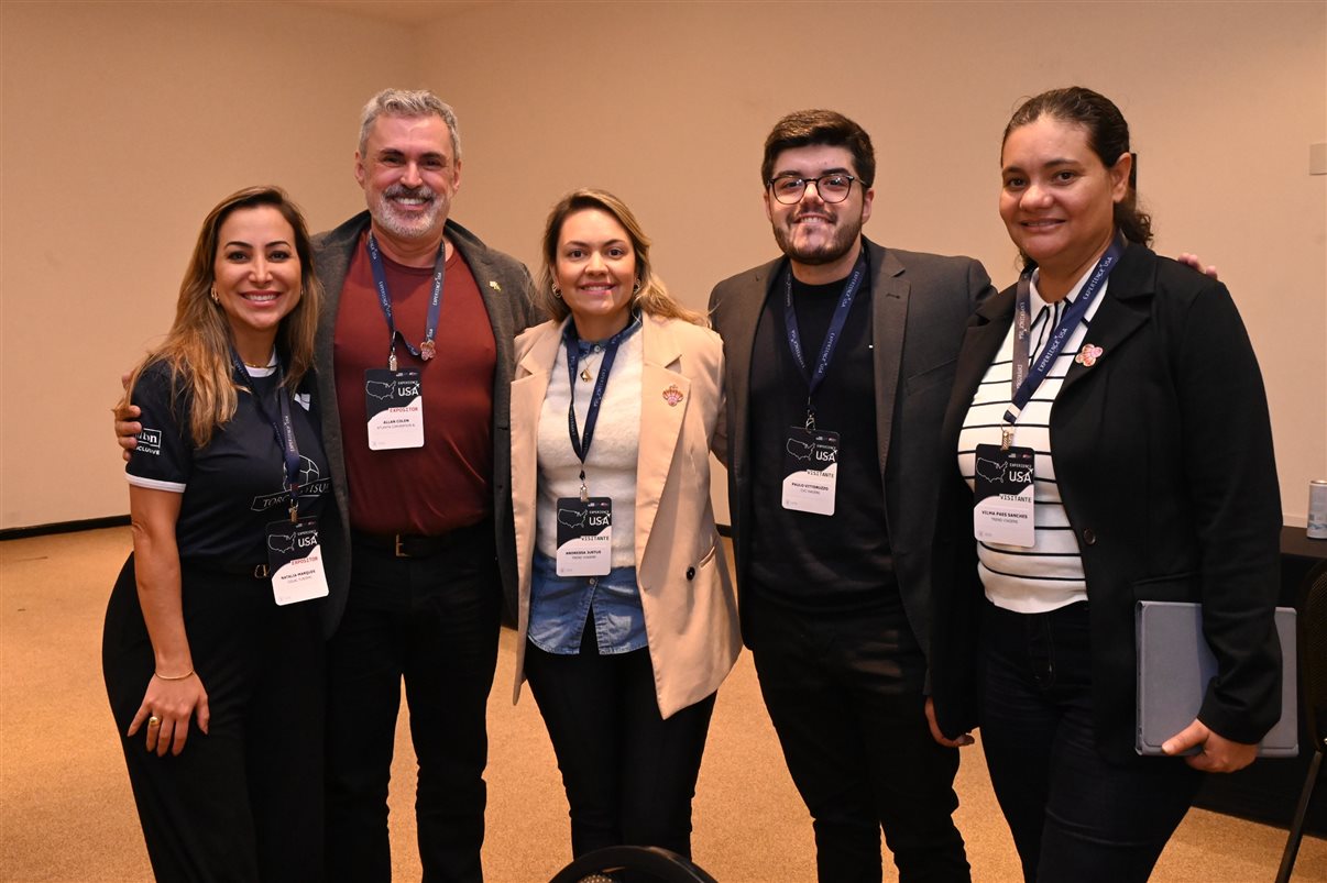 Michael Marangel, Nicole Desilvis e Nathan Traurig, do Consulado dos EUA